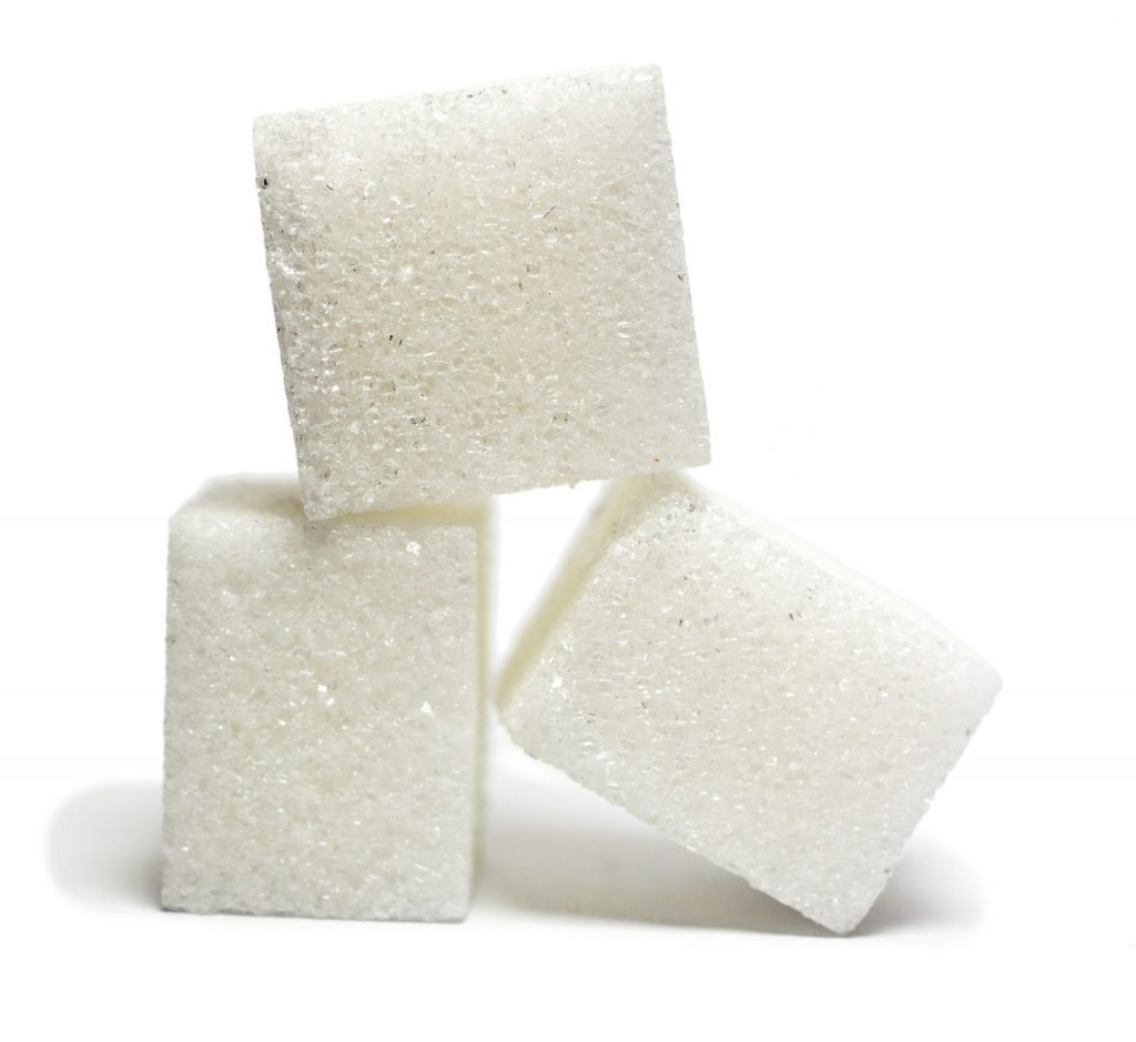 SUGAR INTAKE SHOULD BE REDUCED TO PREVENT TOOTH DECAY-min