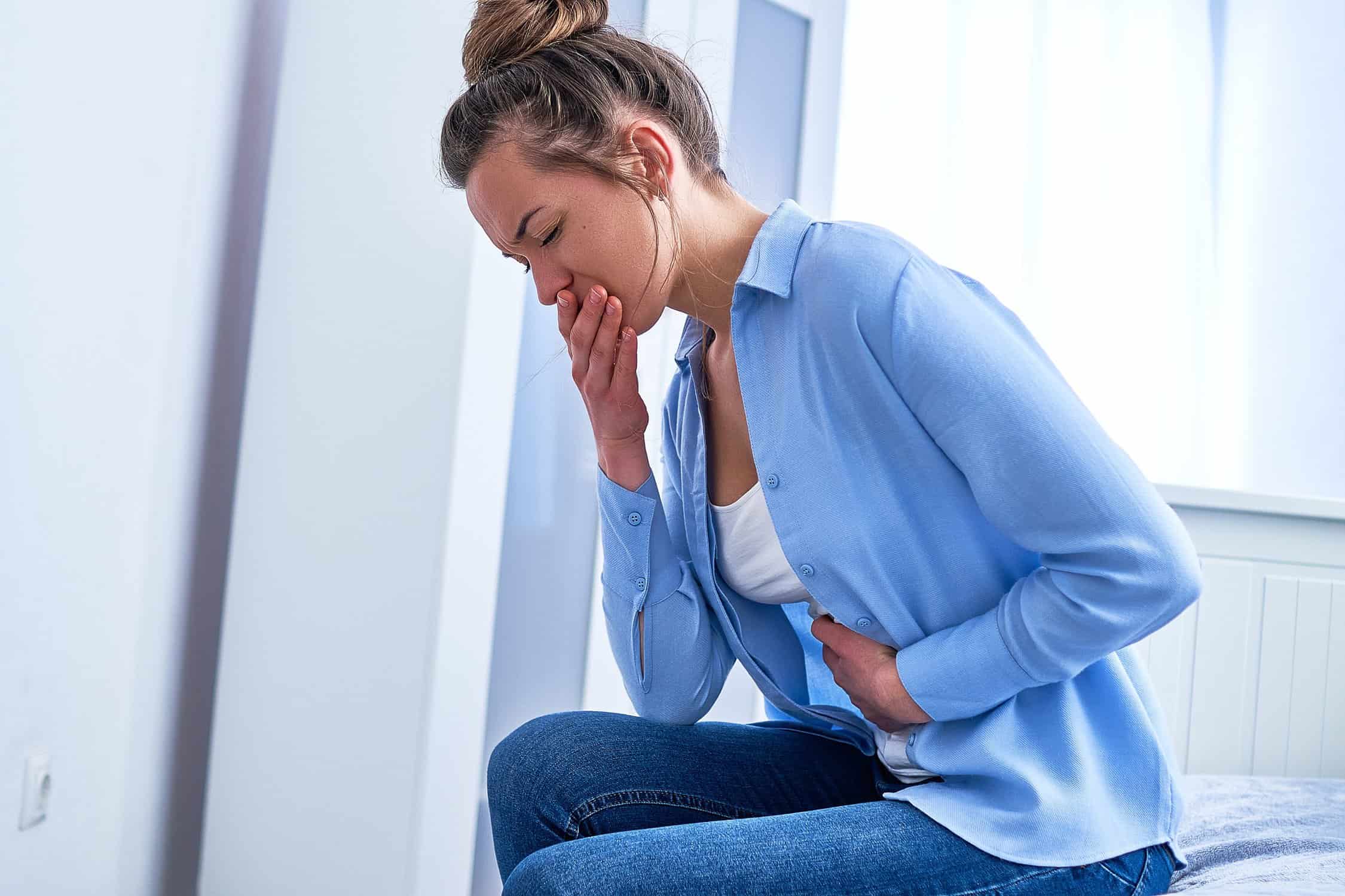 female-suffers-from-nausea-and-vomiting-due-to-digestive-and-stomach